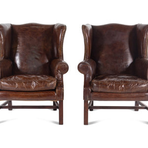 Appraisal: A Pair of Georgian Style Leather Upholstered Wingback Armchairs th