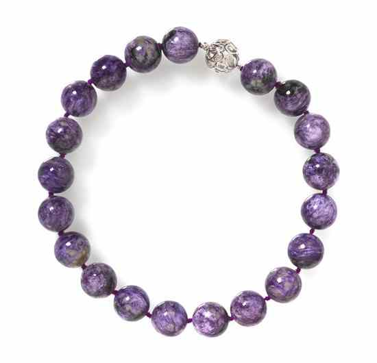 Appraisal: A Single Strand Charoite Bead Necklace containing charoite beads measuring