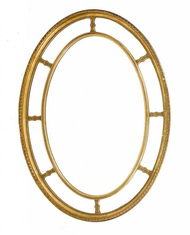 Appraisal: A GILTWOOD AND COMPOSITION OVAL MIRROR in neo classical style