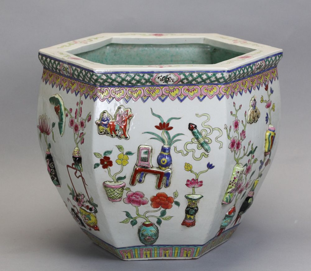 Appraisal: Chinese hexagonal porcelain fishbowl planter decorated with antique objects in