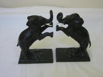 Appraisal: A PAIR OF AUSTRIAN BRONZE BOOKENDS modelled as rearing elephants