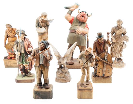 Appraisal: Sale Lot A Group of Nine Carved Wood Figures comprising