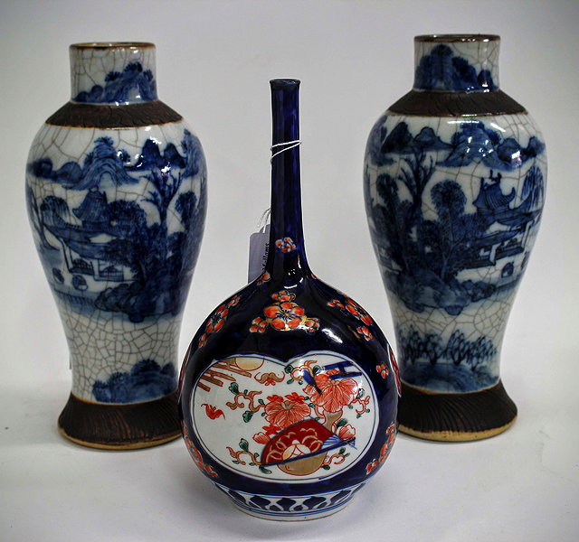 Appraisal: AN ORIENTAL IMARI BOTTLE VASE cm in height together with