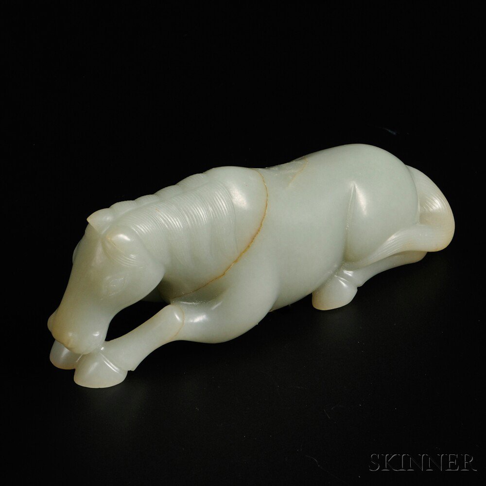 Appraisal: Jade Horse China the recumbent animal carved with its head