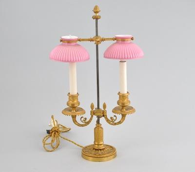 Appraisal: A Continental Ormolu Double Arm Student Lamp With Empire style