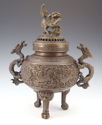 Appraisal: CHINESE BRONZE CENSOR Dragon handles Foo dog finial backstamp on