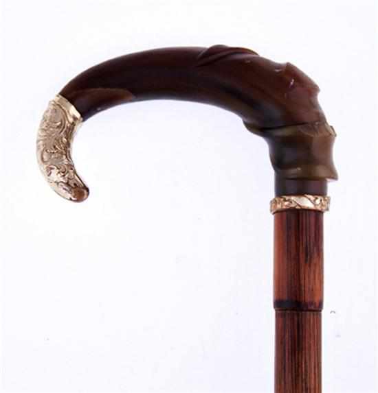 Appraisal: Victorian horn bamboo and gold cane umbrella handle th century