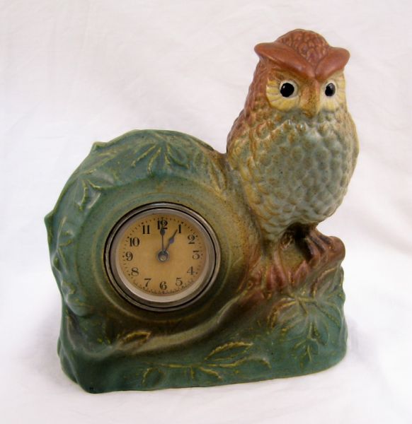 Appraisal: Yellow ware Owl Pottery Clock Perched owl form yellow ware