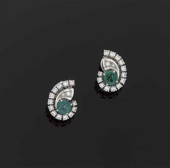 Appraisal: EMERLALD AND DIAMOND CLIP EARRINGS White gold Elegant clip earrings