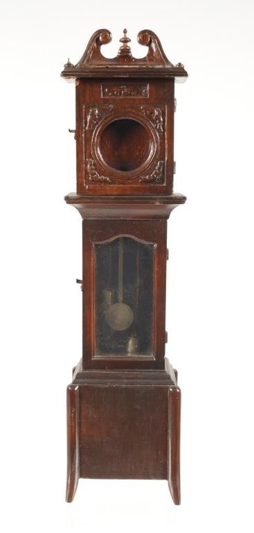 Appraisal: Antique miniature grandfather clock with carved out opening for a