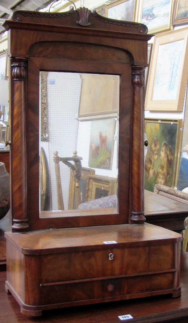 Appraisal: A Biedermeier mahogany dressing table mirror with split column decoration