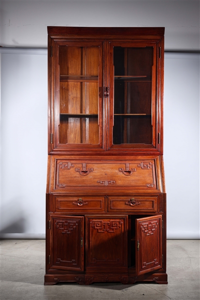 Appraisal: Large wooden secretary desk with hutch cabinet with glass panels