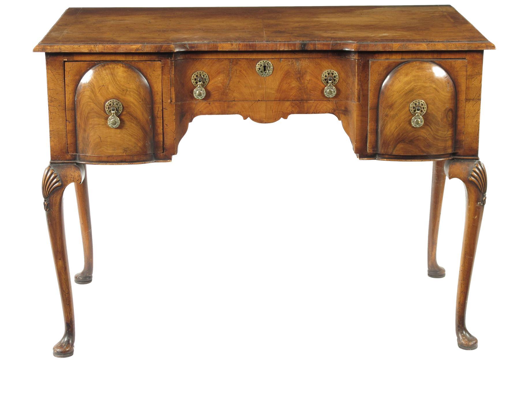 Appraisal: A walnut dressing table in Queen Anne style