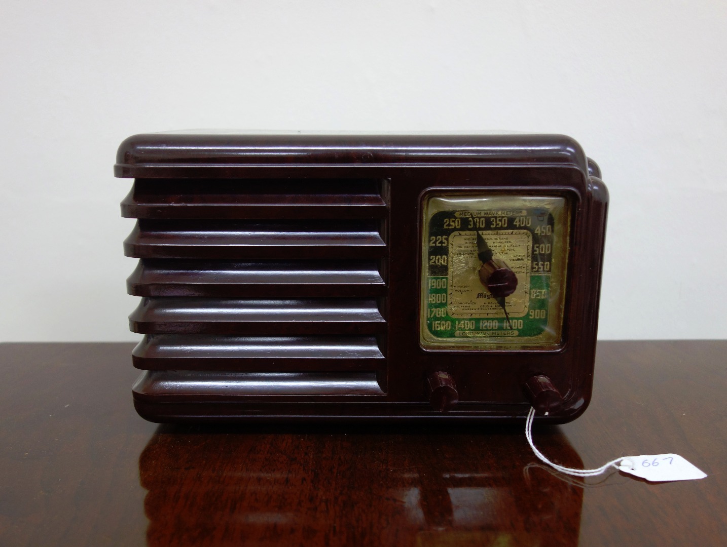 Appraisal: A Mayfair table top mini valve radio in brown bakelite