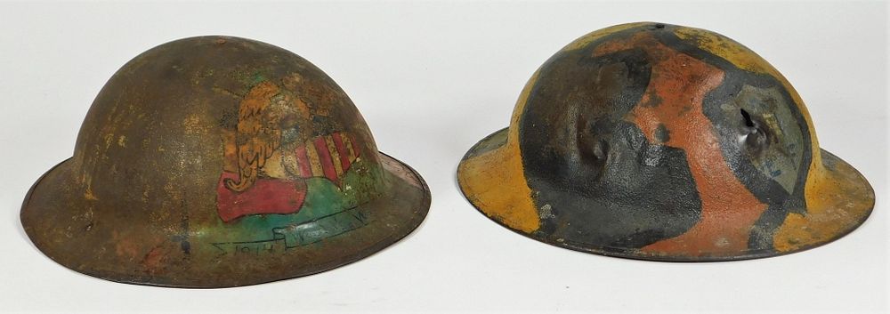 Appraisal: Two WWI Painted Helmets United States C - A helmet