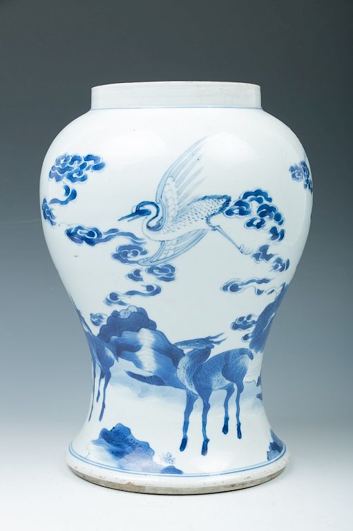 Appraisal: BLUE AND WHITE VASE REPAIRED QING The blue and white