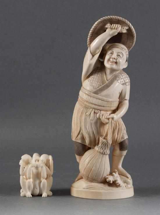 Appraisal: Japanese carved ivory figure of a man with sack and