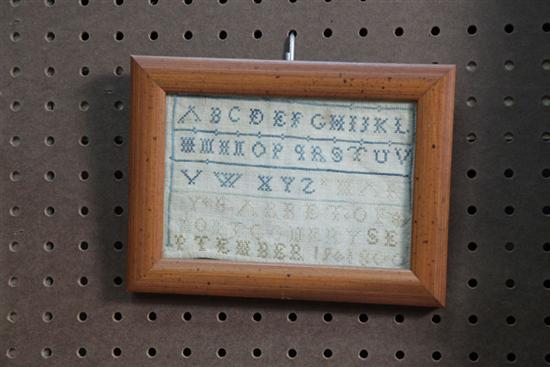 Appraisal: FRAMED MINIATURE SAMPLER Worked in blue and cream Inscribed ''MARY