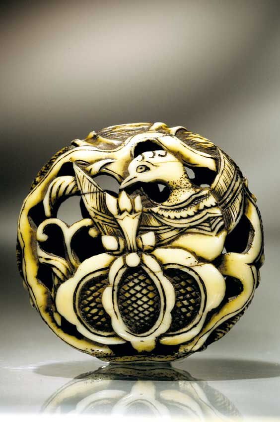 Appraisal: ANTIQUE IVORY MANJU NETSUKE Antique carved marine ivory openwork ryusa