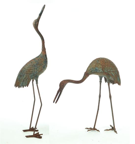 Appraisal: PAIR OF CAST IRON BIRDS American mid th century Cranes