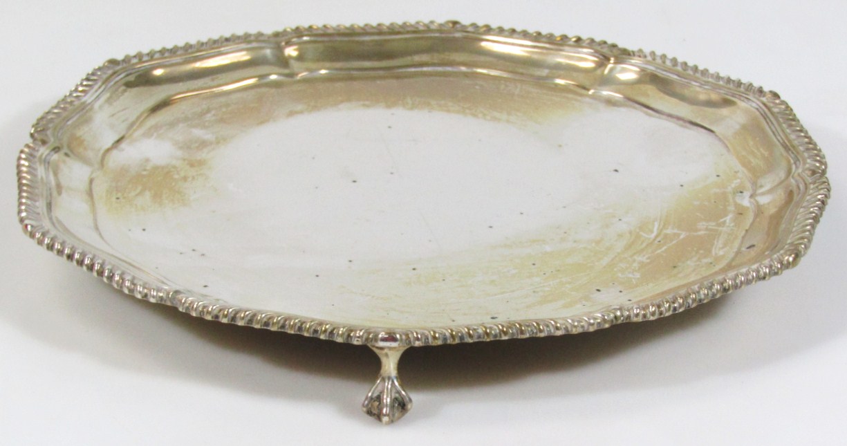 Appraisal: An Edwardian silver salver of pie crust gadrooned outline on