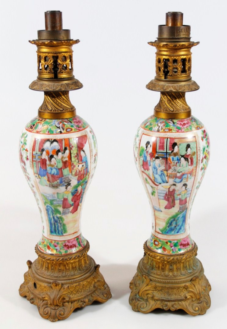 Appraisal: A pair of thC Chinese famille rose lamp vases each