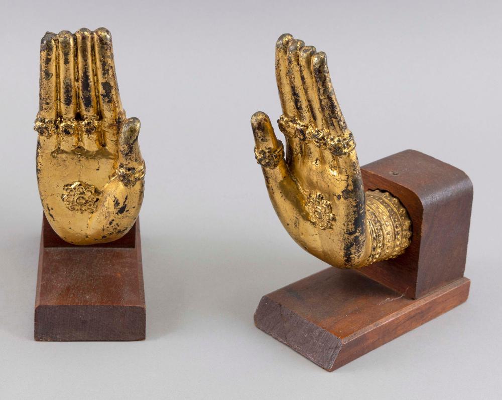 Appraisal: PAIR OF THAI HAND-FORM GILT BOOKENDS TH CENTURY HEIGHTS PAIR