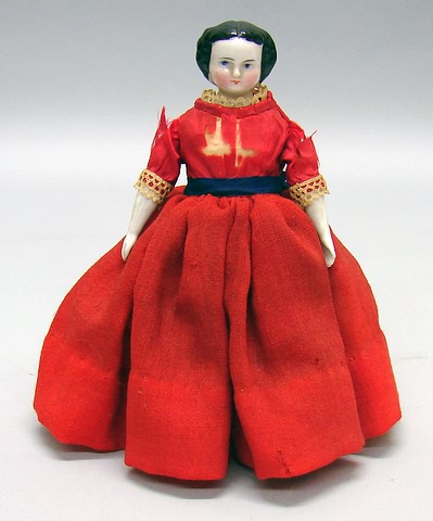 Appraisal: Unmarked 's china head doll Black hair Cloth body appears