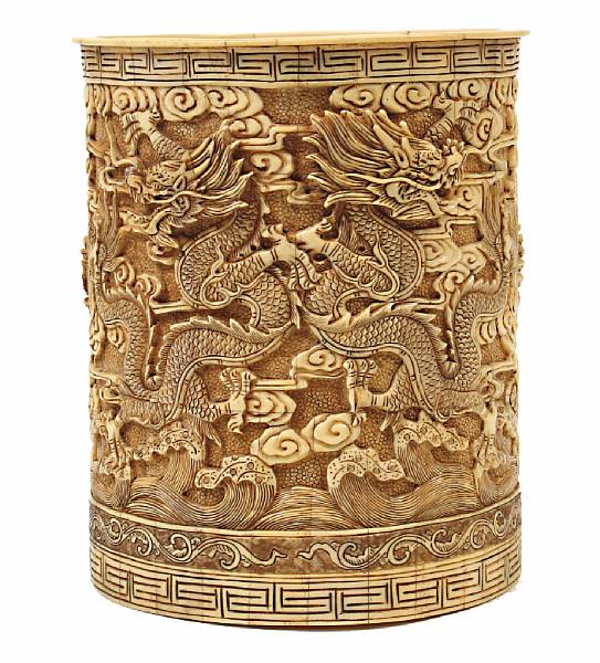 Appraisal: A Chinese carved and pieced ivory brush pot height in