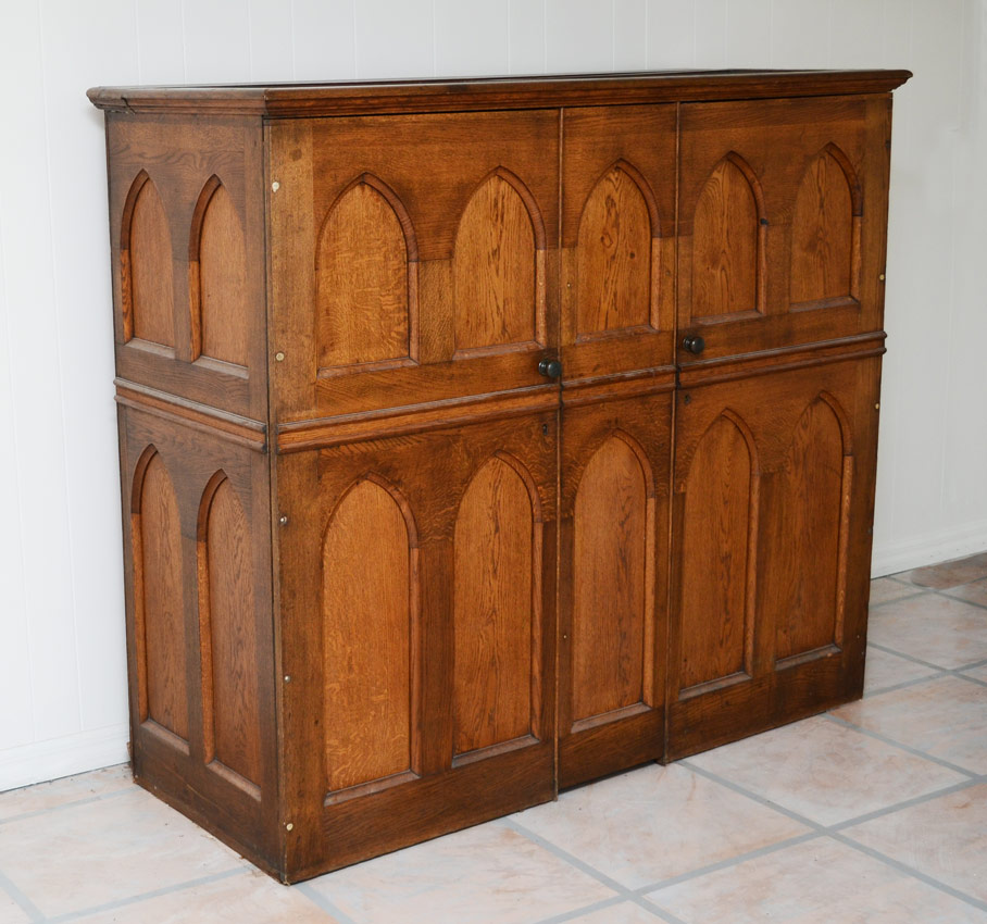 Appraisal: CARVED OAK DOOR CUPBOARD doors with arched panels an front