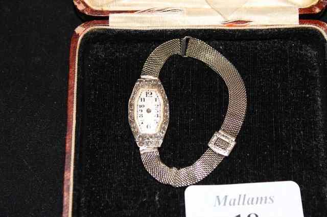 Appraisal: A LADIES WHITE METAL WRIST WATCH the octagonal silver dial