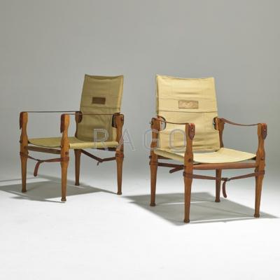 Appraisal: MELVILLE MOON Pair of Safari chairs United Kingdom s Teak