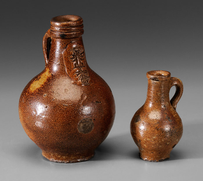 Appraisal: Two Diminutive Bellarmine Jugs German th century one with molded