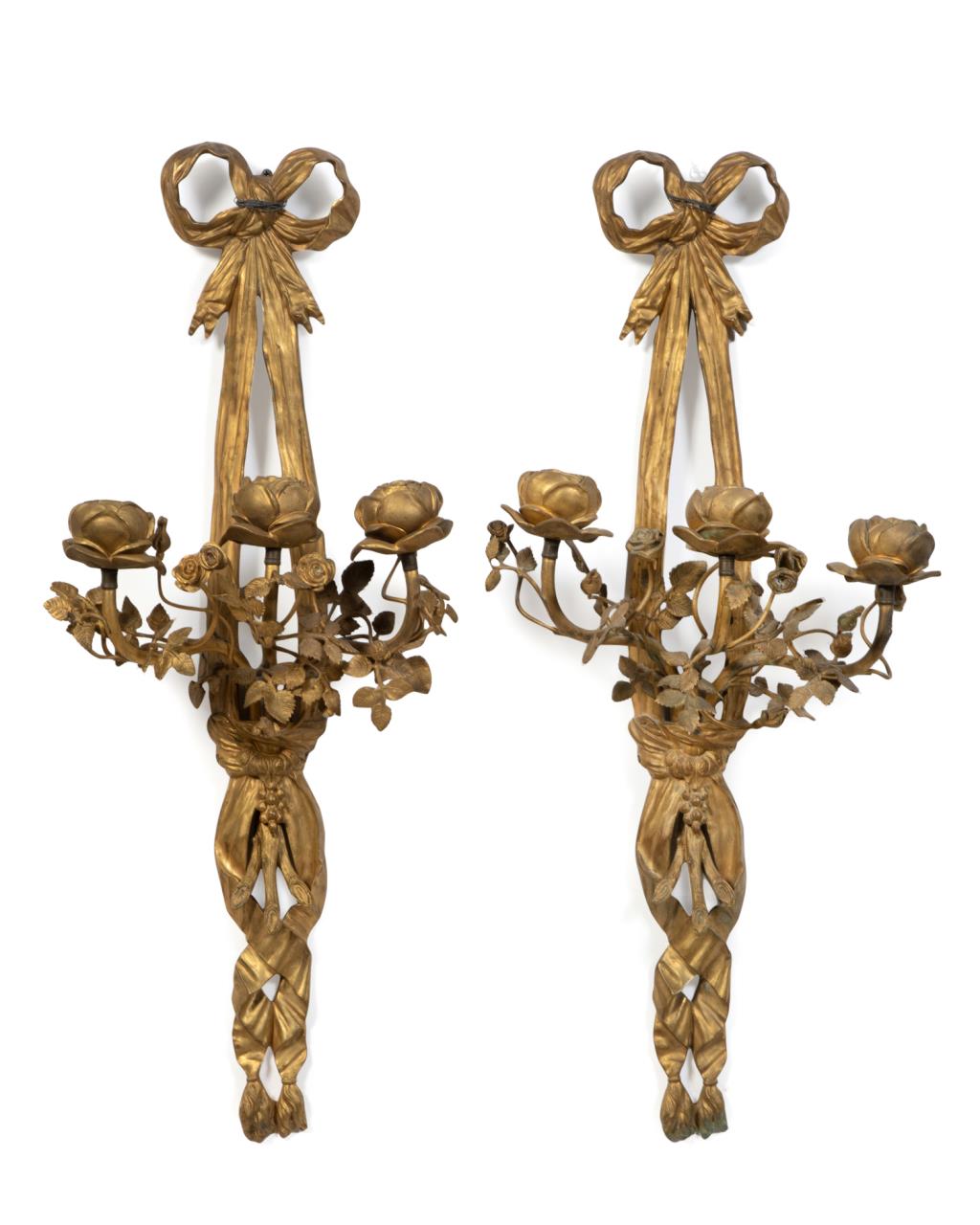 Appraisal: PAIR OF LOUIS XV STYLE THREE LIGHT BRONZE SCONCES Pair