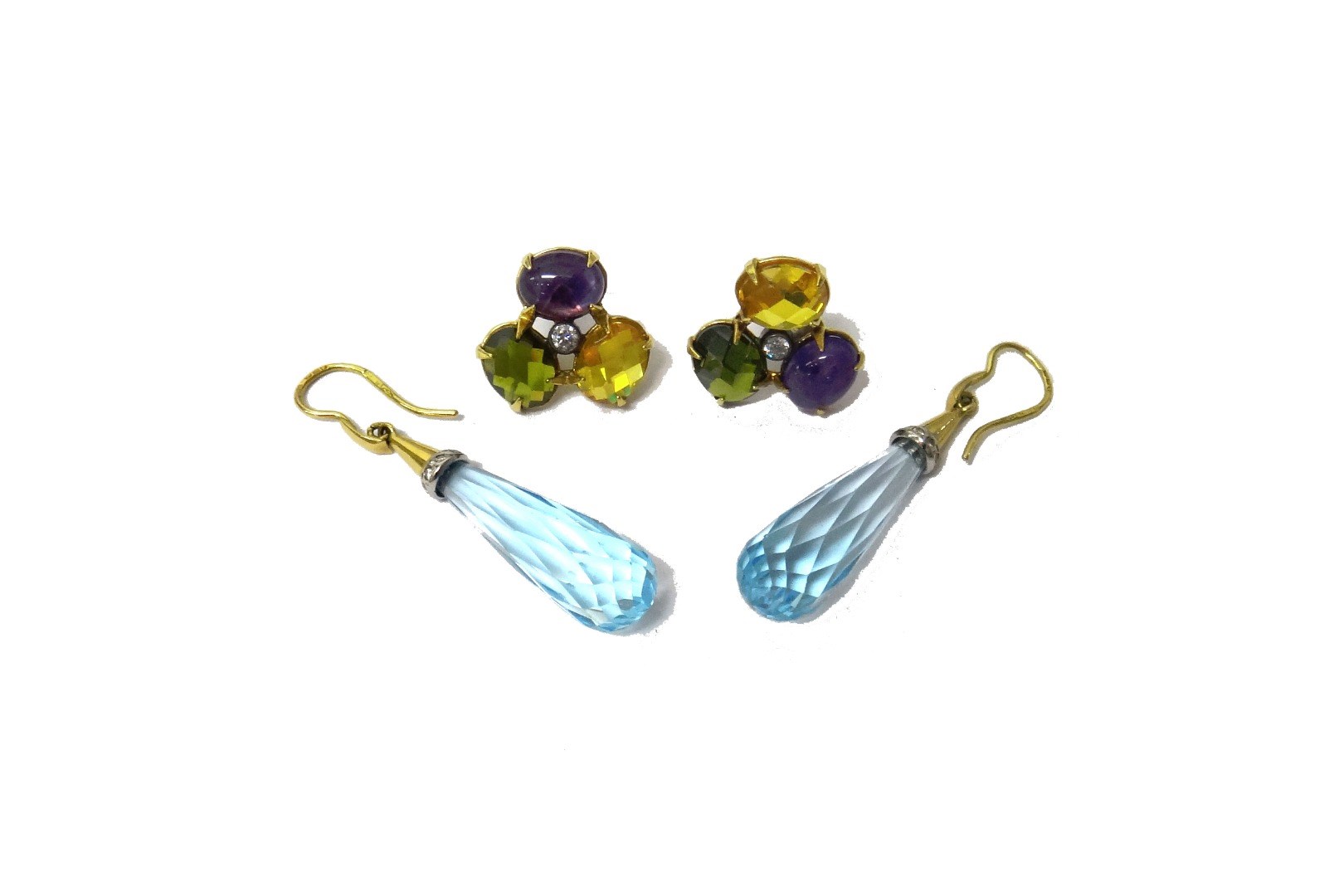 Appraisal: A pair of gold and diamond topped aquamarine pendant earrings