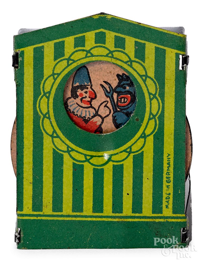 Appraisal: German animated Punch Judy penny toy German tin lithograph animated