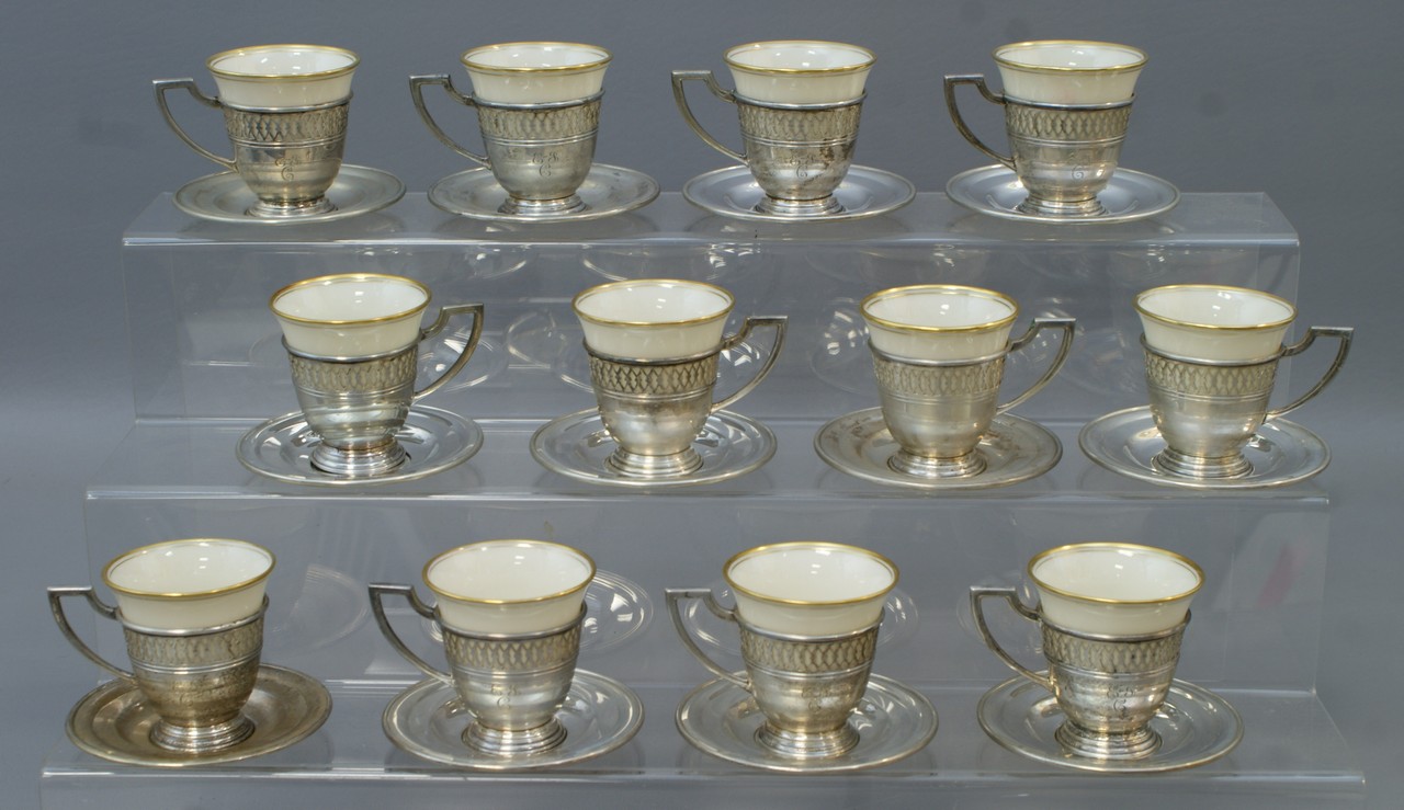 Appraisal: sterling silver demitasse cups and saucers with Lenox inserts