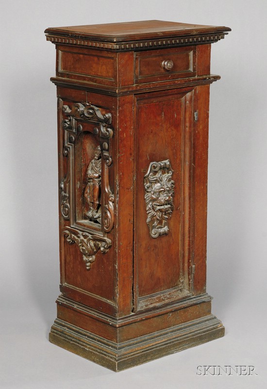 Appraisal: Italian Renaissance-style Carved Walnut Ecclesiastical Cupboard composed of antique elements