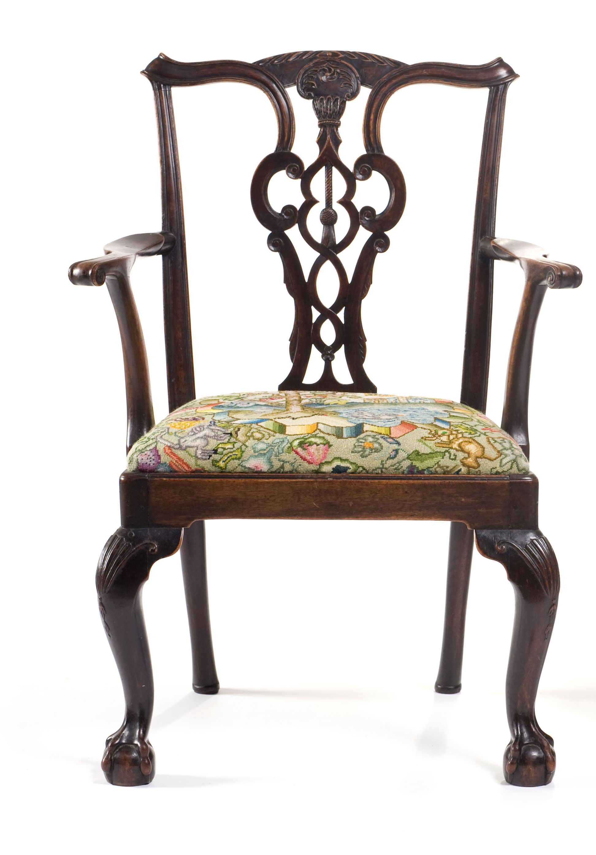 Appraisal: ENGLISH CHIPPENDALE CARVED MAHOGANY ARMCHAIR WITH NEEDLEPOINT SEAT The shaped