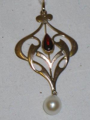 Appraisal: A GARNET AND PEARL PENDANT the ct gold Art Nouveau