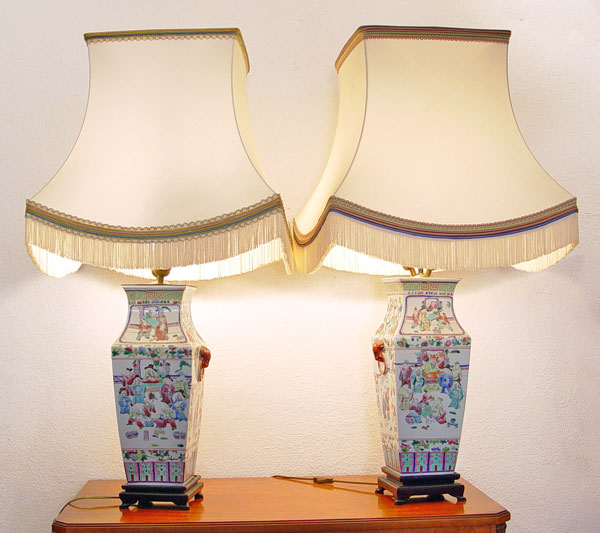 Appraisal: PAIR CHINESE CERAMIC VASES MOUNTED AS LAMPS Substantial polychrome lamps