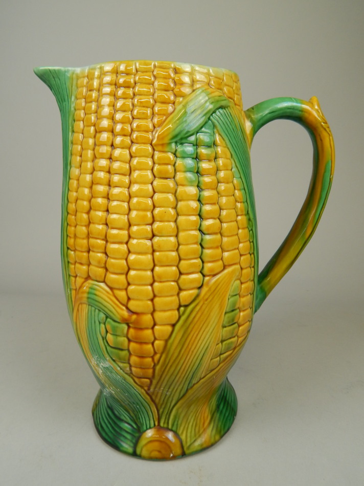 Appraisal: A Majolica style jug relief moulded with corn on the