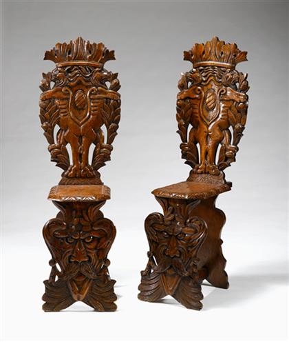 Appraisal: Pair of Baroque style Italian carved oak hall chairs H