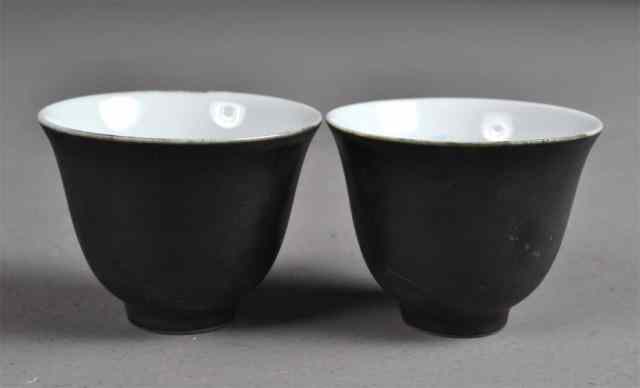 Appraisal: Pair of Chinese Monochrome Tea CupsSmall pair of white porcelain