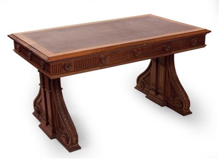 Appraisal: An Empire style mahogany library table the moulded rectangular top