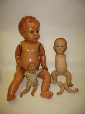 Appraisal: An Armand Marseille bisque head baby doll with brown glass