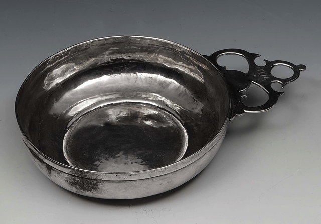 Appraisal: A JAMES II SILVER PORRINGER of plain circular form with