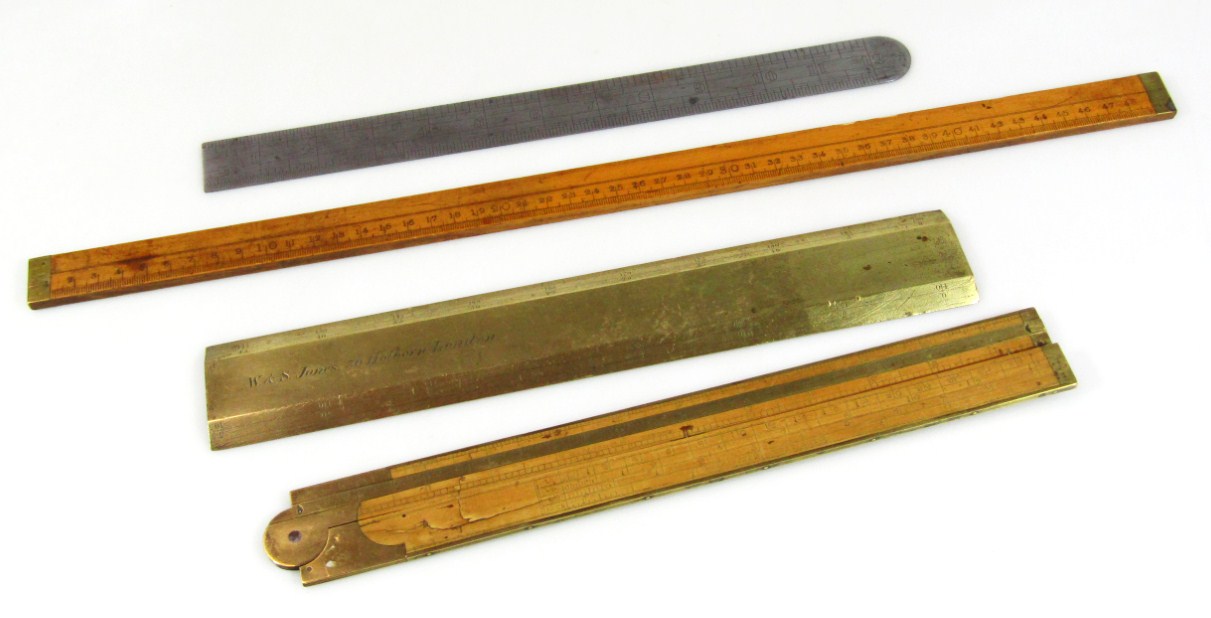 Appraisal: Various rulers etc comprising a brass heavy scale rule marked