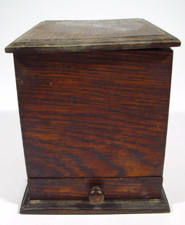 Appraisal: Edwardian oak cigarette box with drawer to base cm high