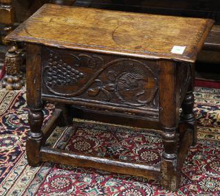 Appraisal: Jacobean hinged stool executed in oak circa having a rectangular